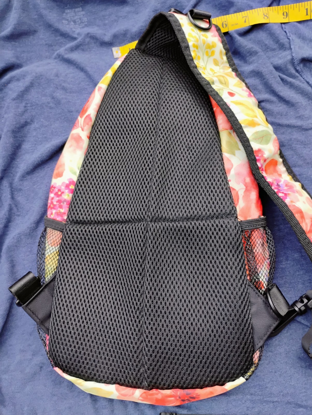 Cross body backpack sling with floral print adjustable strap