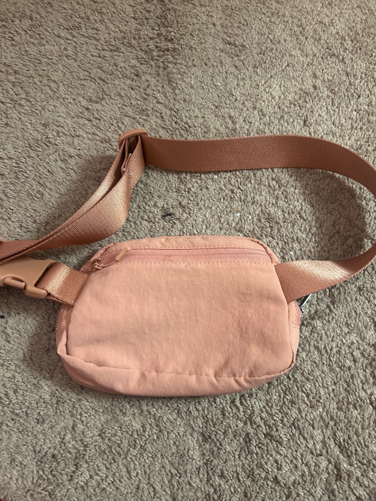 lululemon fanny pack, coral pink color, barely used, shiny logos