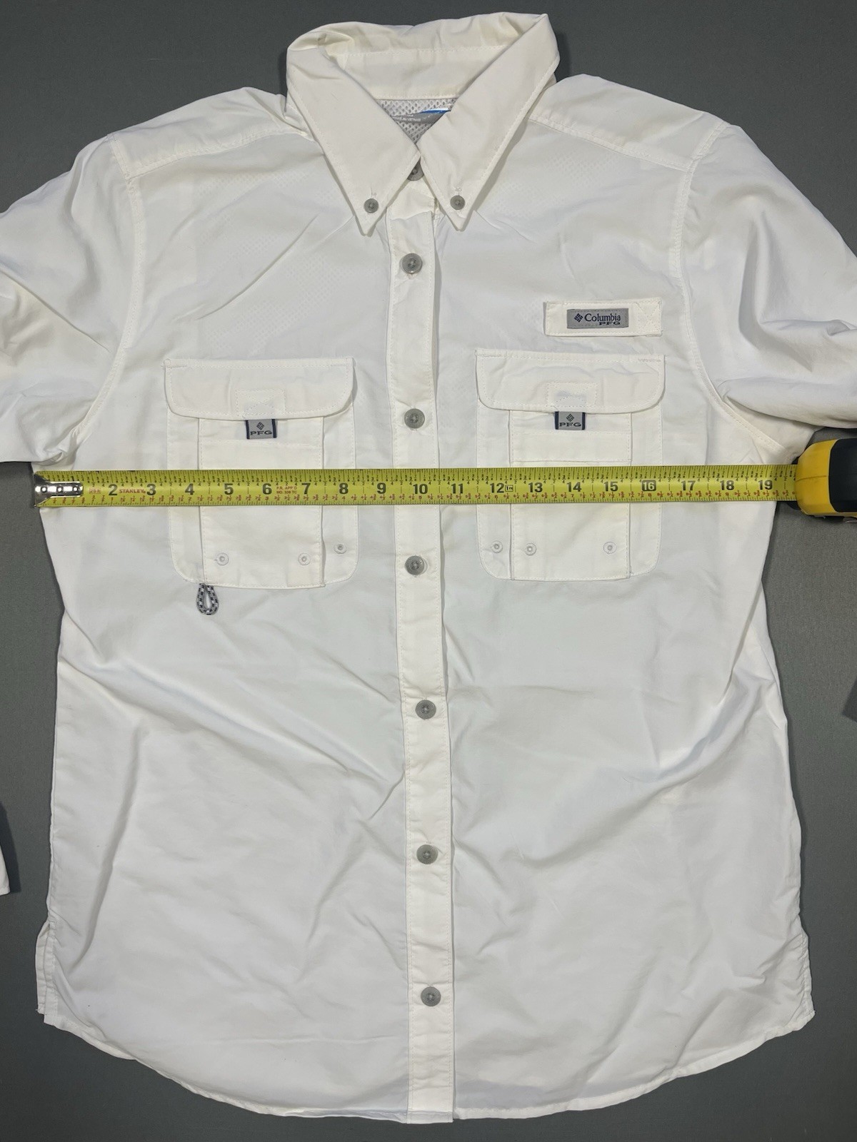 White Columbia PFG Bahama II and features two chest pockets with Utility Loops