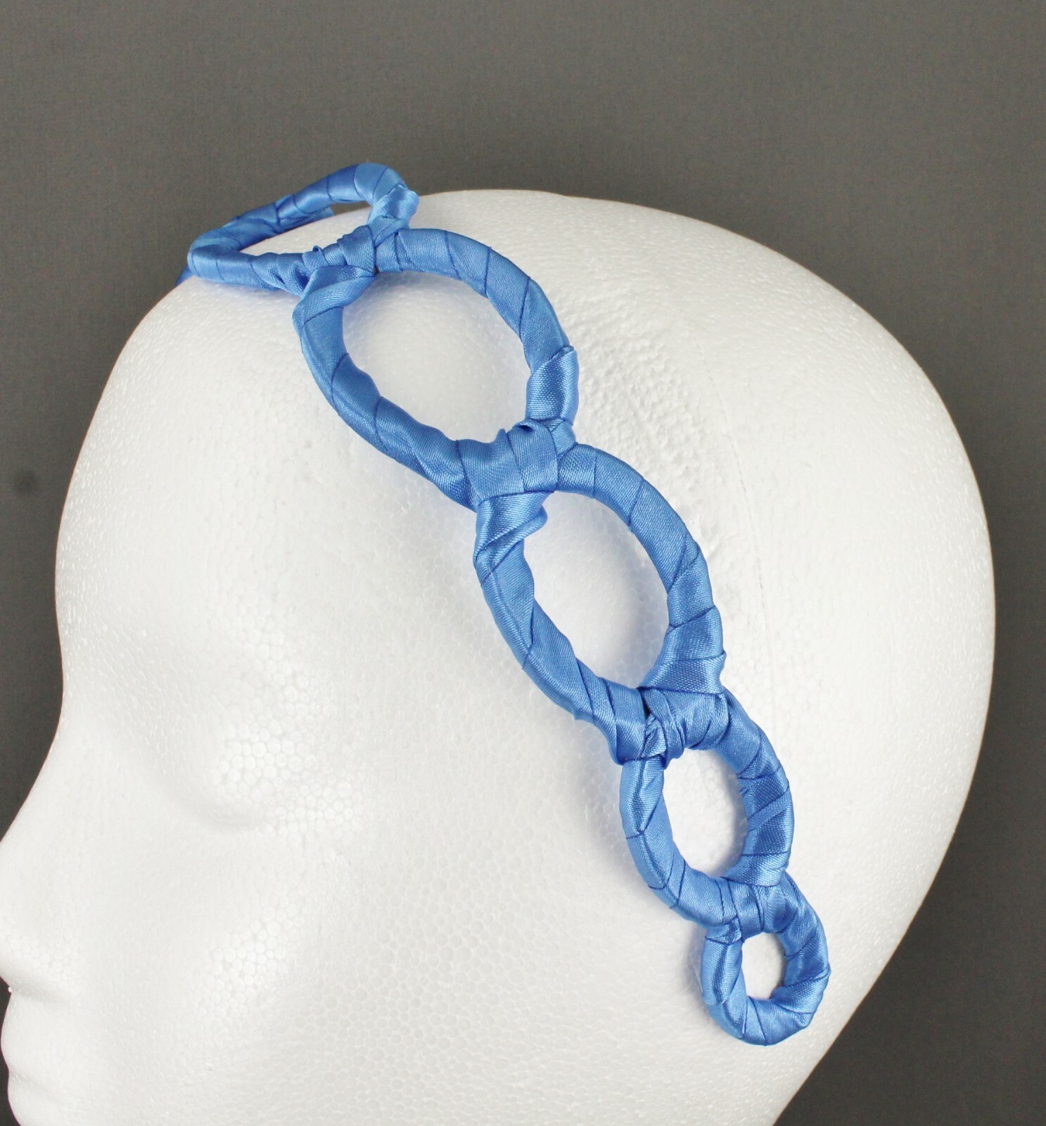 Aqua satin wrapped fabric 1 3/8″ wide headband oval chain link cut out pattern