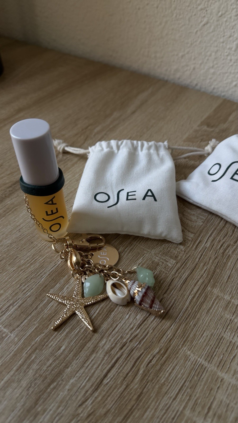 OSEA Gold Tone Beach Nautical Detachable Charm Key Chain S with lip oil