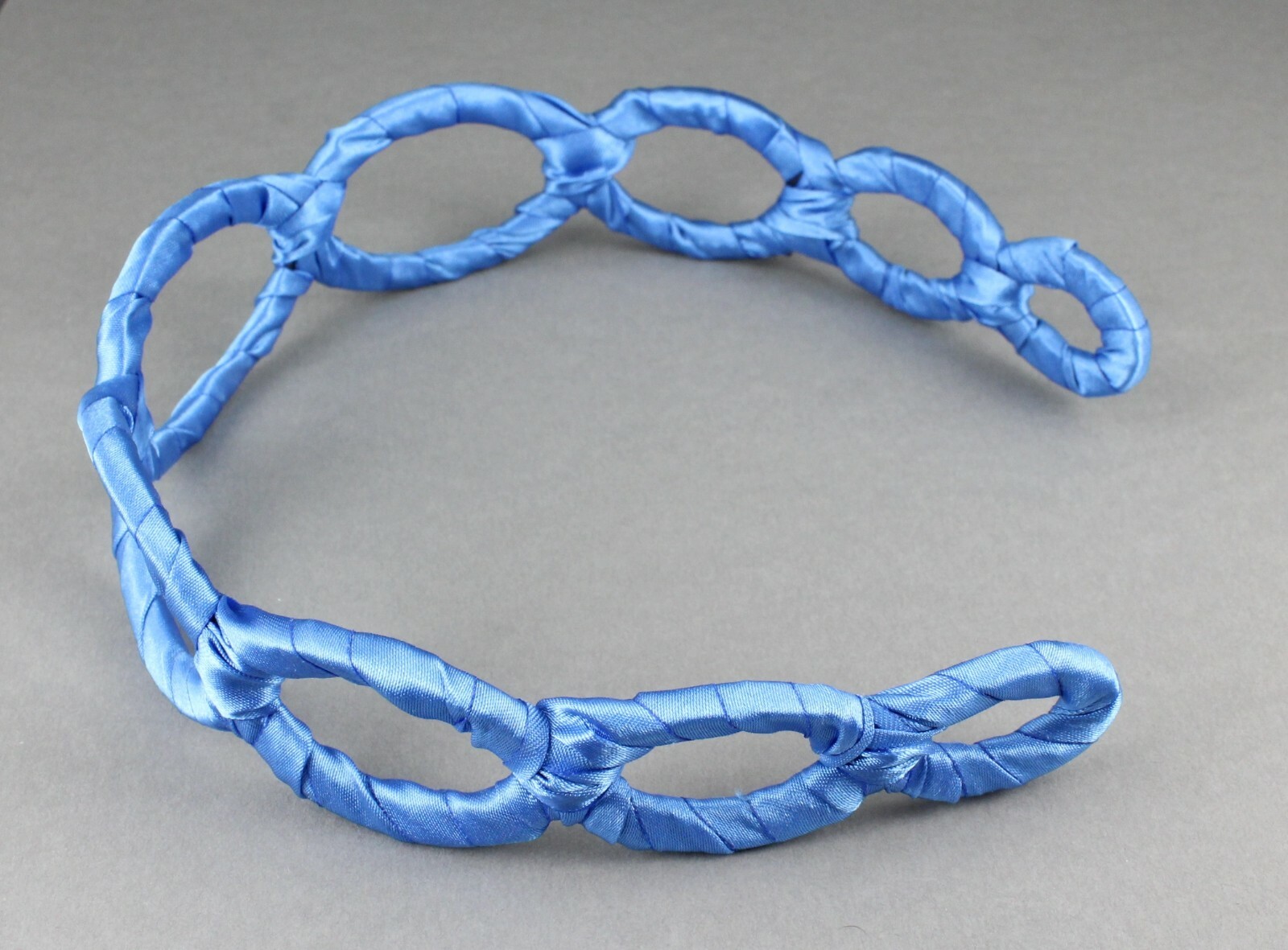 Aqua satin wrapped fabric 1 3/8″ wide headband oval chain link cut out pattern