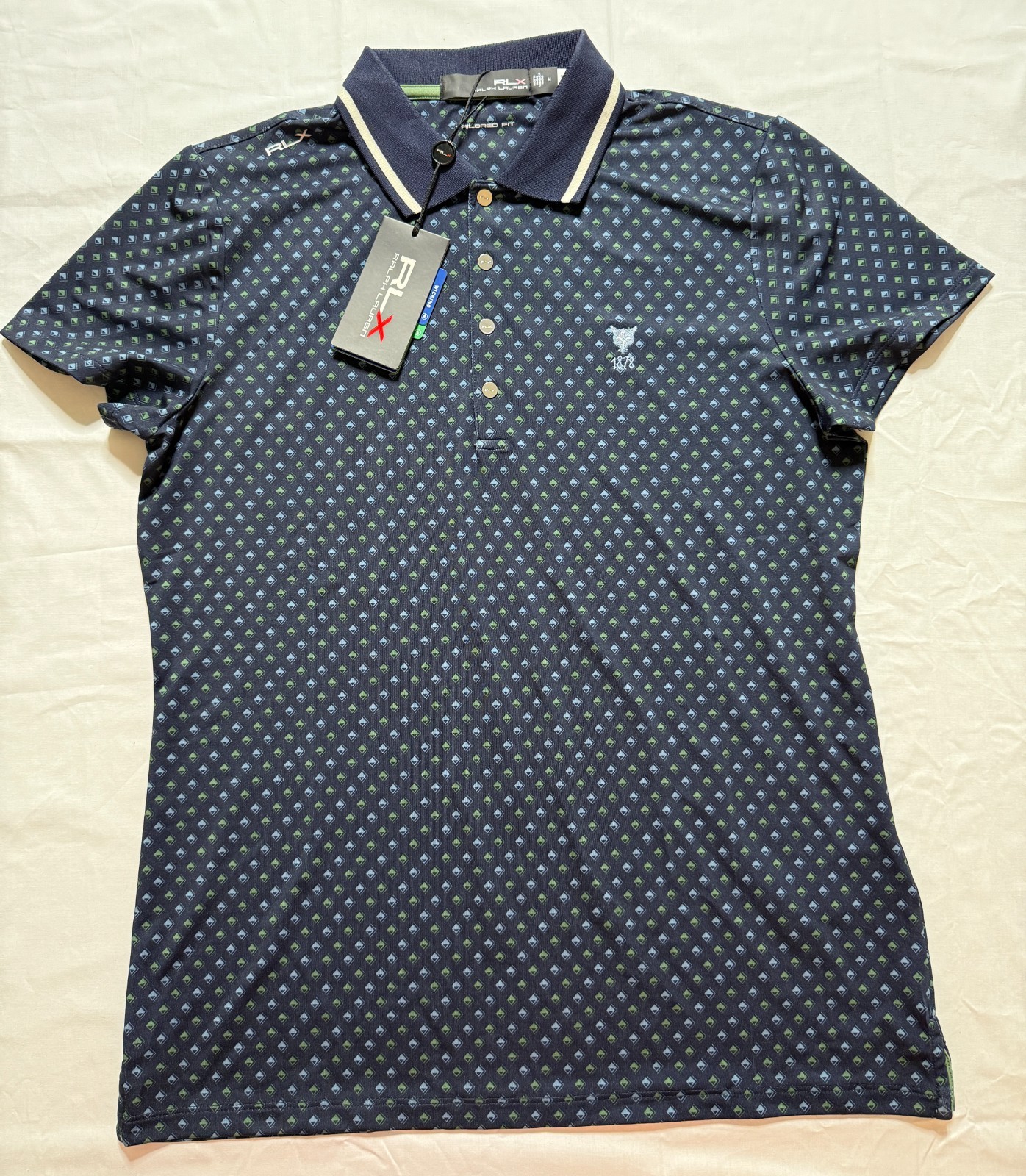 NWT WOMEN’S RLX RALPH LAUREN GOLF SHIRT – SIZE: MEDIUM – NAVY W/ PRINT (A4.8)