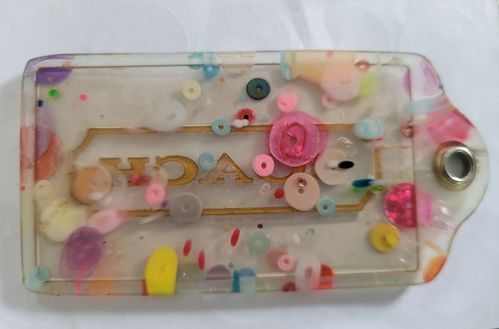COACH Poppy multicolor confetti shaker hangtag