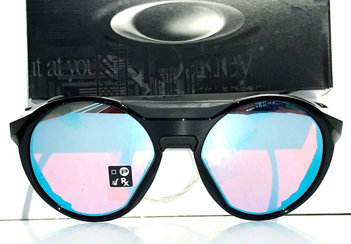 NEW Oakley CLIFDEN Polished Black Round PRIZM Snow Sapphire Sunglass 9440-02