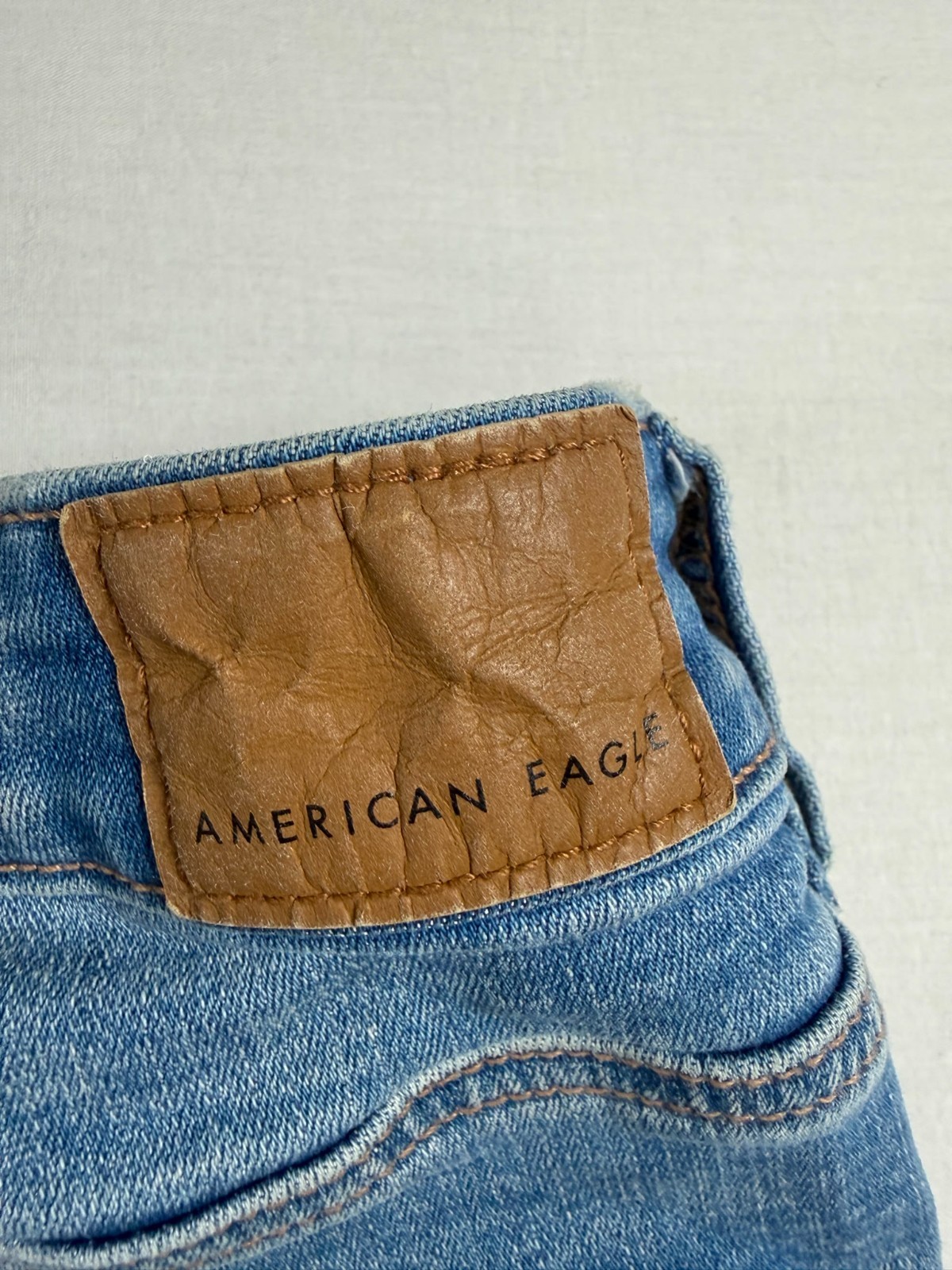 American Eagle Hi-Rise Shortie Light Wash Distressed Denim Shorts Lace Detail