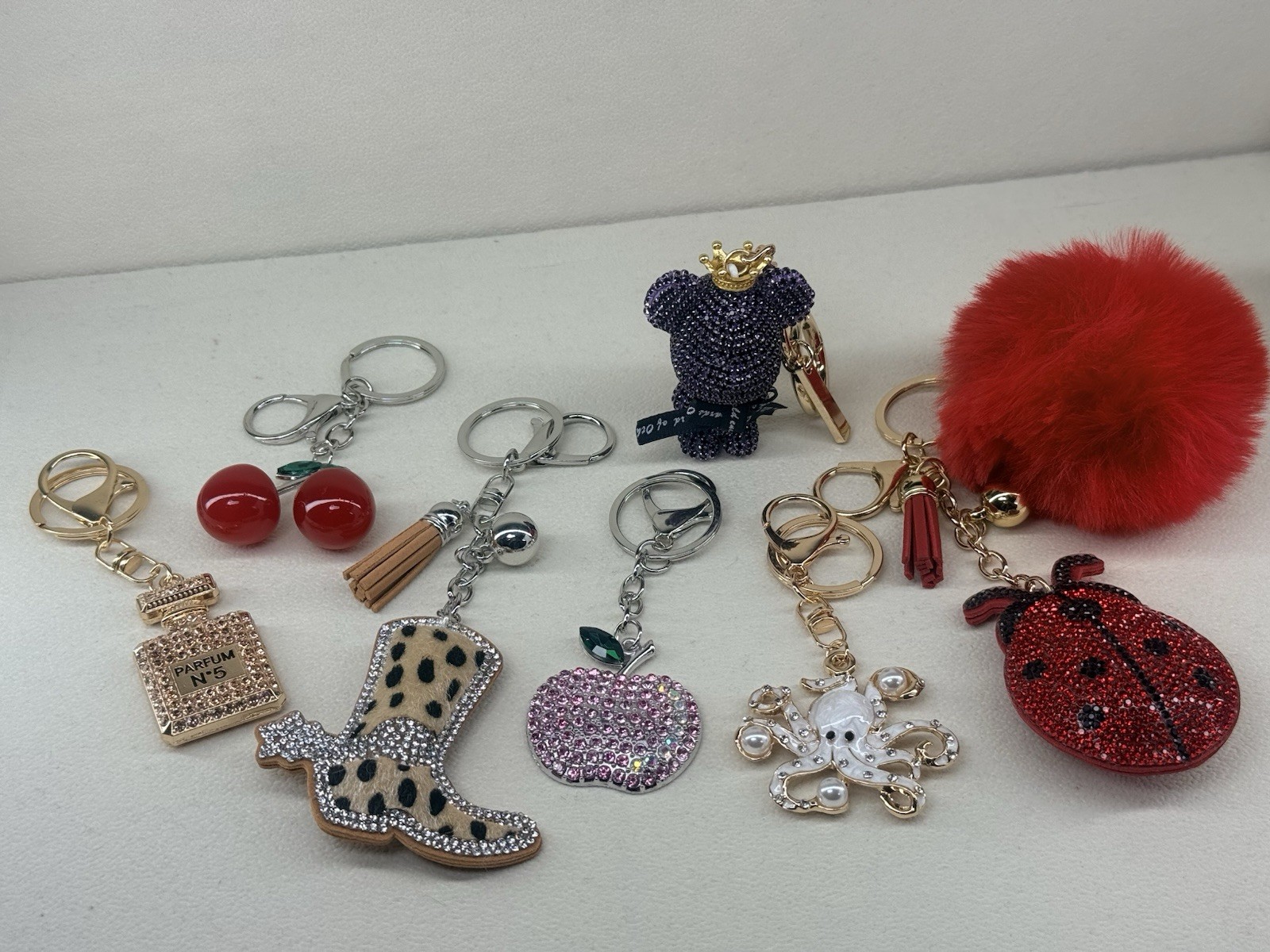 7PC Keychain Bundle Bear Cherry Apple Ladybug Octopus Boot Perfume Pom Pom