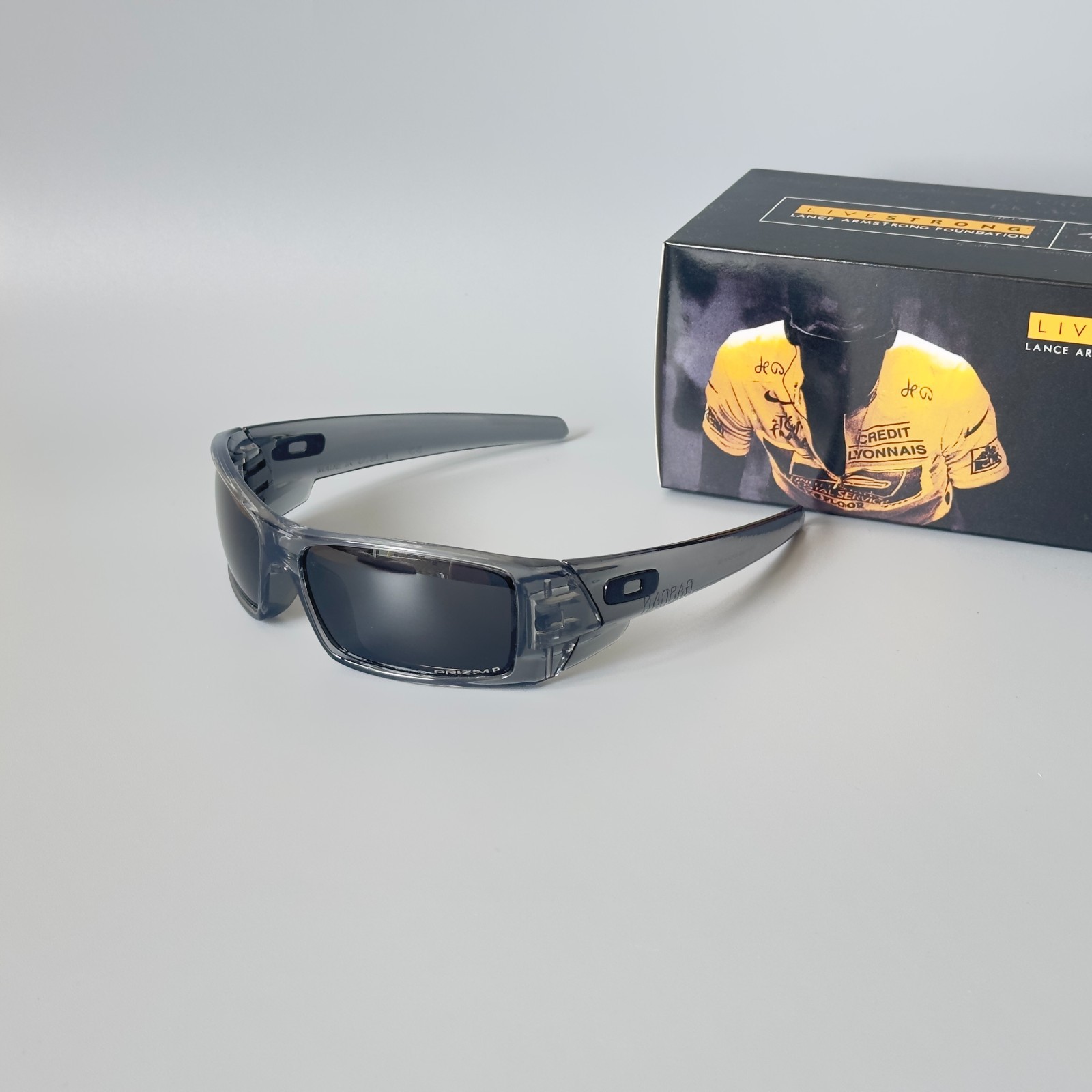 Oakley Gascan OO9014 Polarized Sunglasses Gray transparent Frame Black Lens