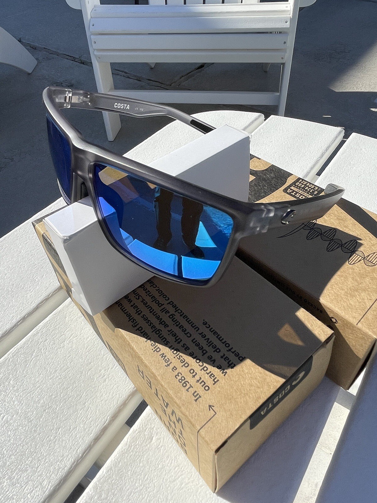 COSTA polarized – Smoke-Clear Frame W/ Blue Polarized lens