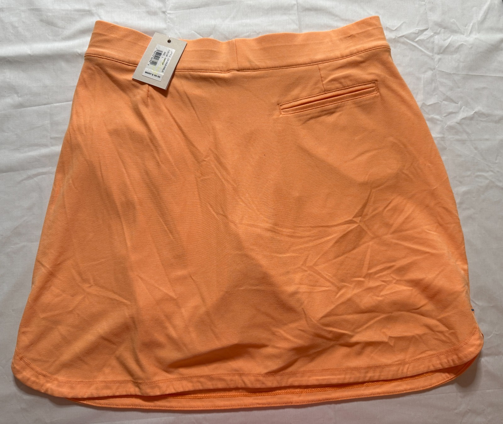 NWT WOMEN’S PETER MILLAR SKORT – SIZE: X-SMALL – ORANGE POP (A4.8)