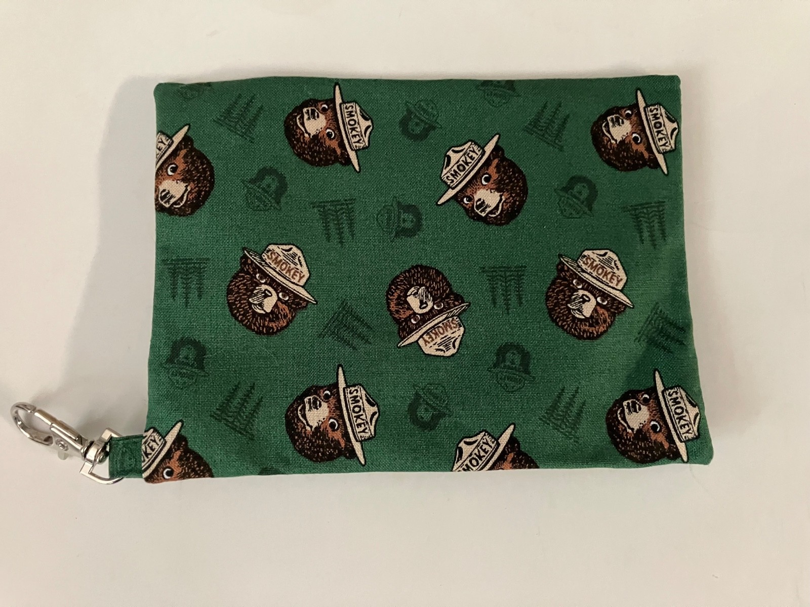 Smokey The Bear Green background small zippered bag