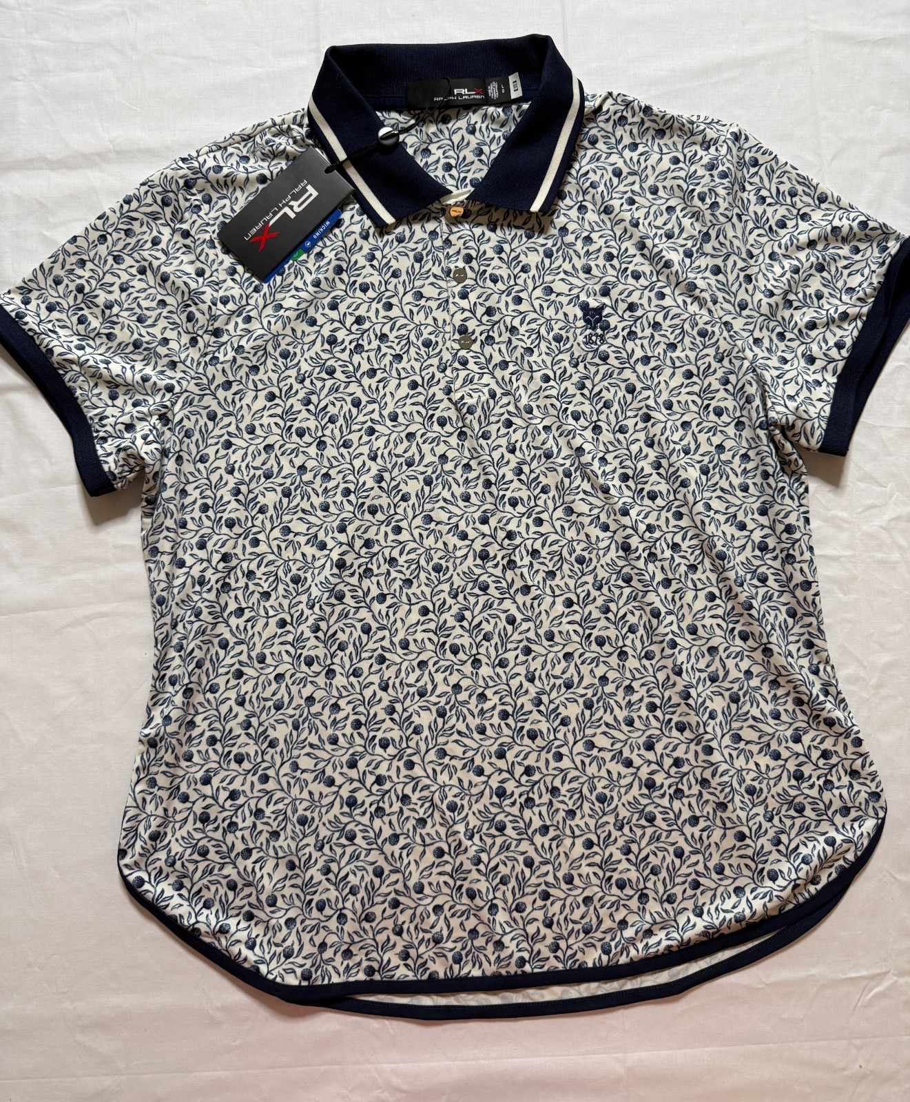 NWT WOMEN’S RLX RALPH LAUREN GOLF SHIRT – SIZE: X-SMALL -WHITE/NAVY PRINT (A4.8)