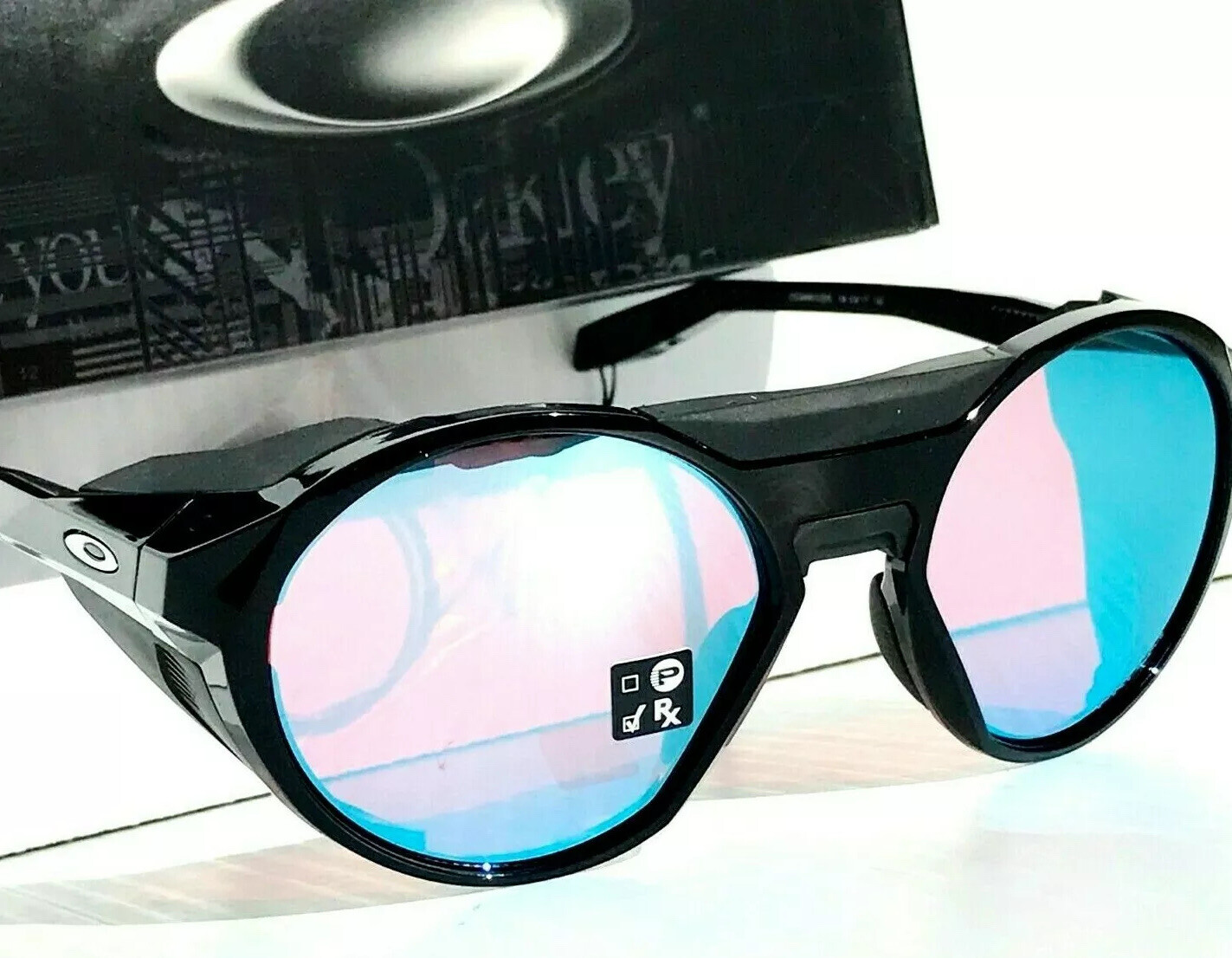 NEW Oakley CLIFDEN Polished Black Round PRIZM Snow Sapphire Sunglass 9440-02