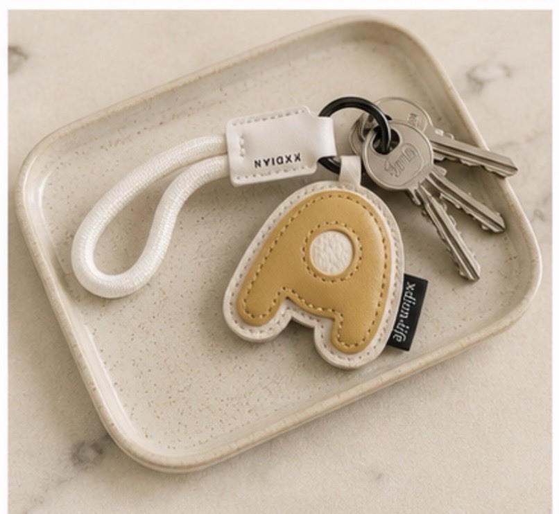 XXDIAN Among Us Video Game Key Chain Beige/White Faux Leather Metal Logo