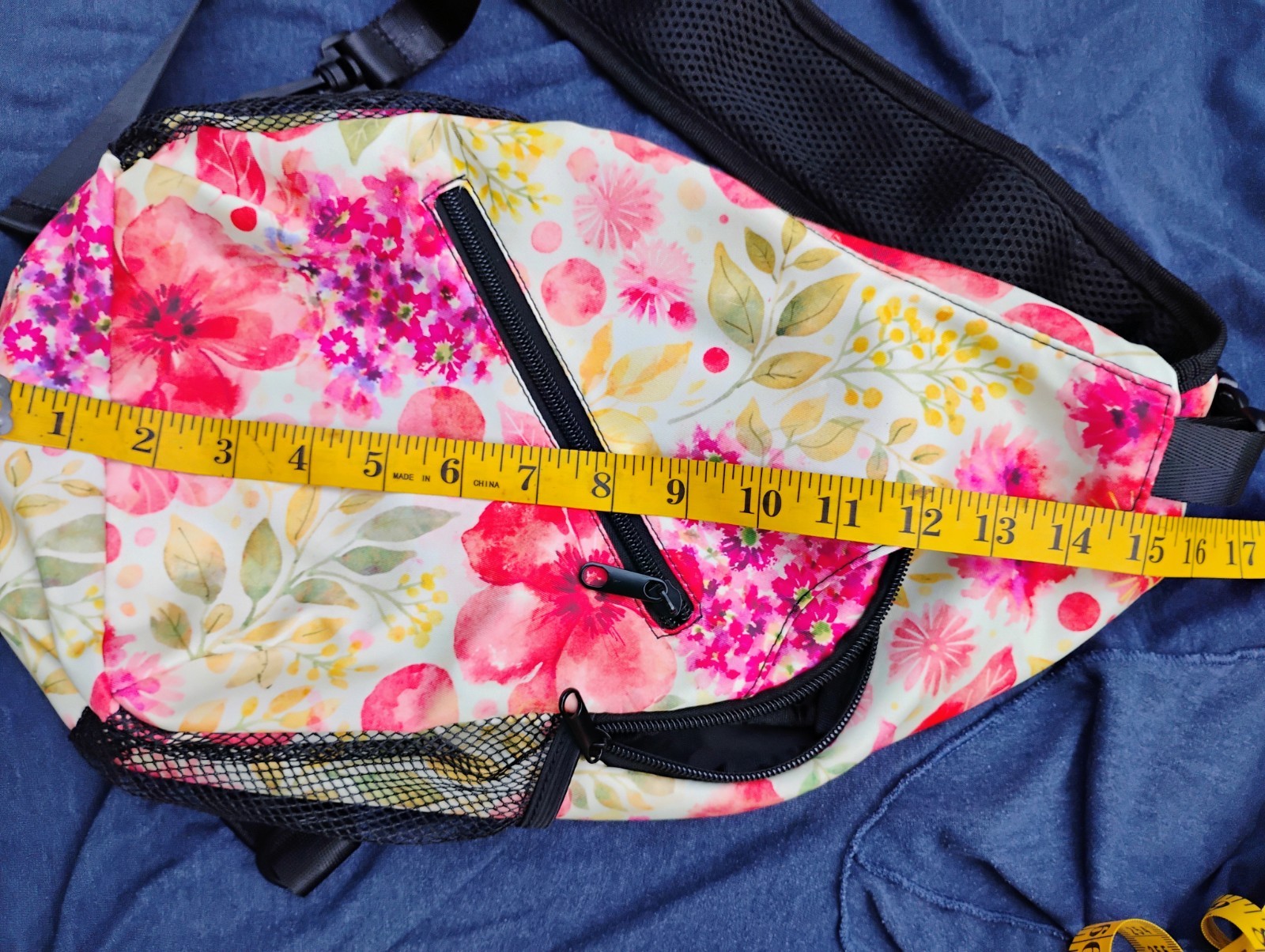 Cross body backpack sling with floral print adjustable strap