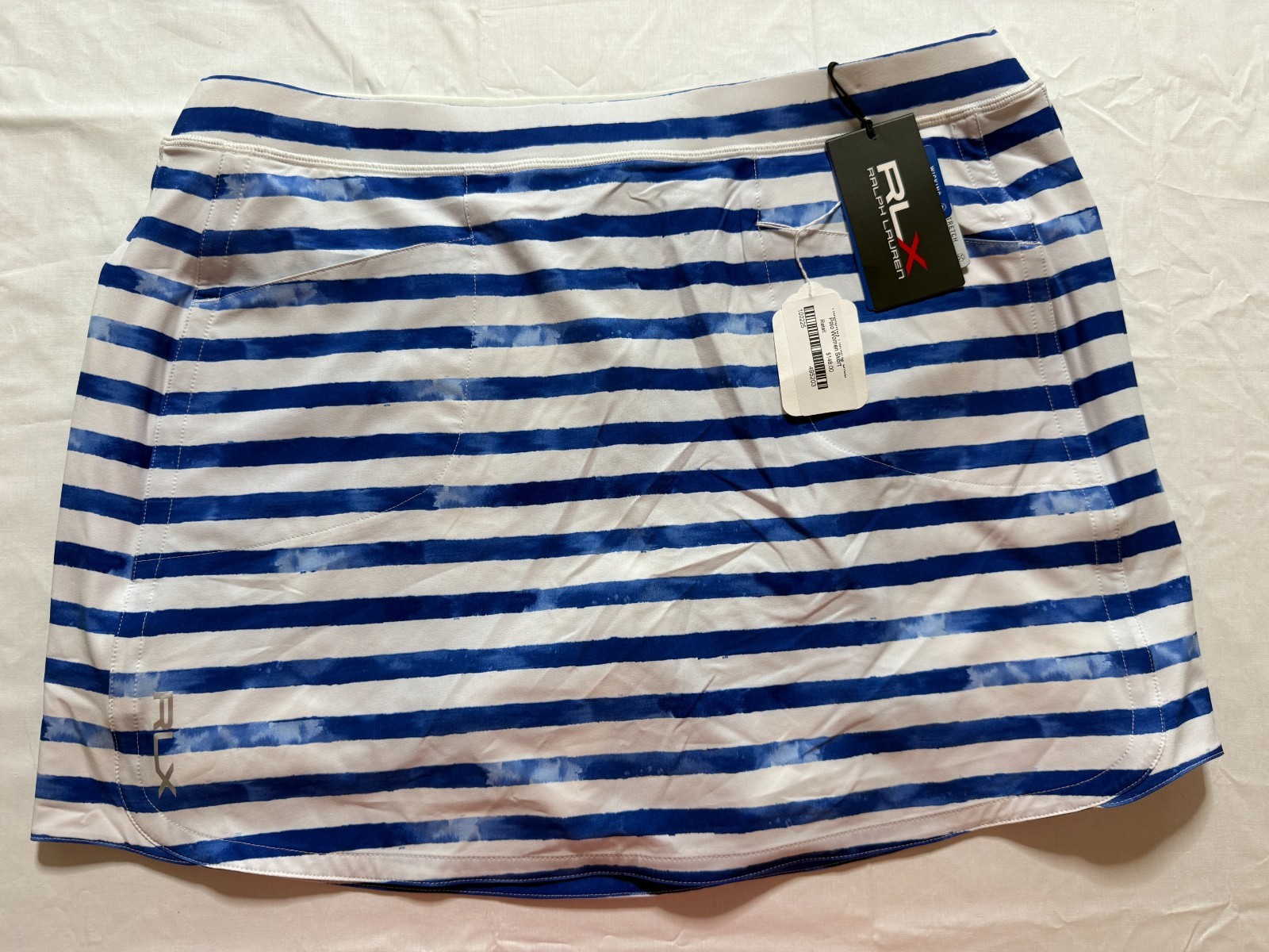 NWT WOMEN’S RLX RALPH LAUREN GOLF SKORT/SKIRT – SIZE: LARGE – BL/ WH STRP (A4.8)