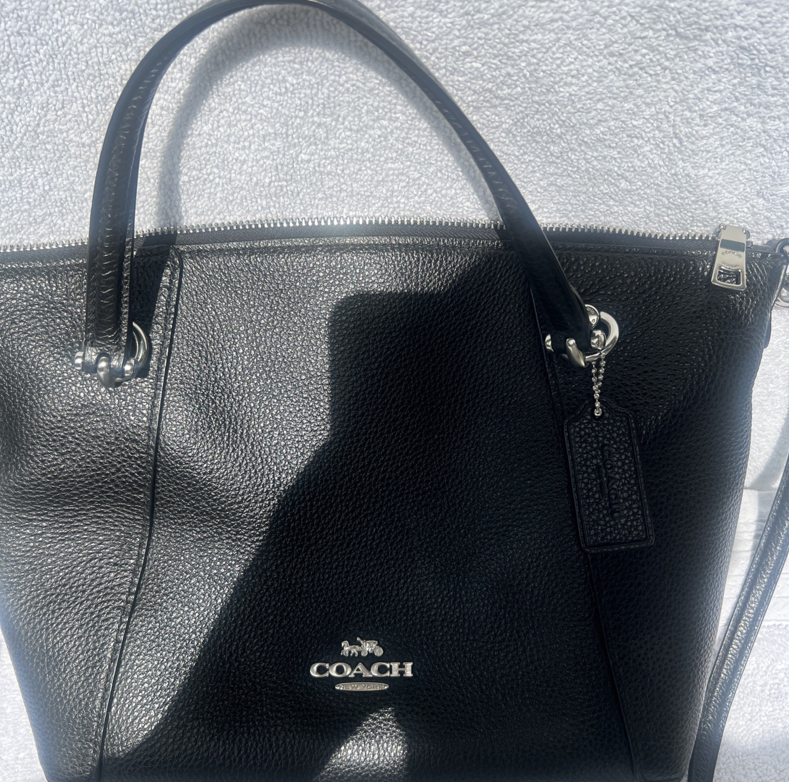 Coach Crossbody Bag Black Pebble Leather black Interior with silver hardware.