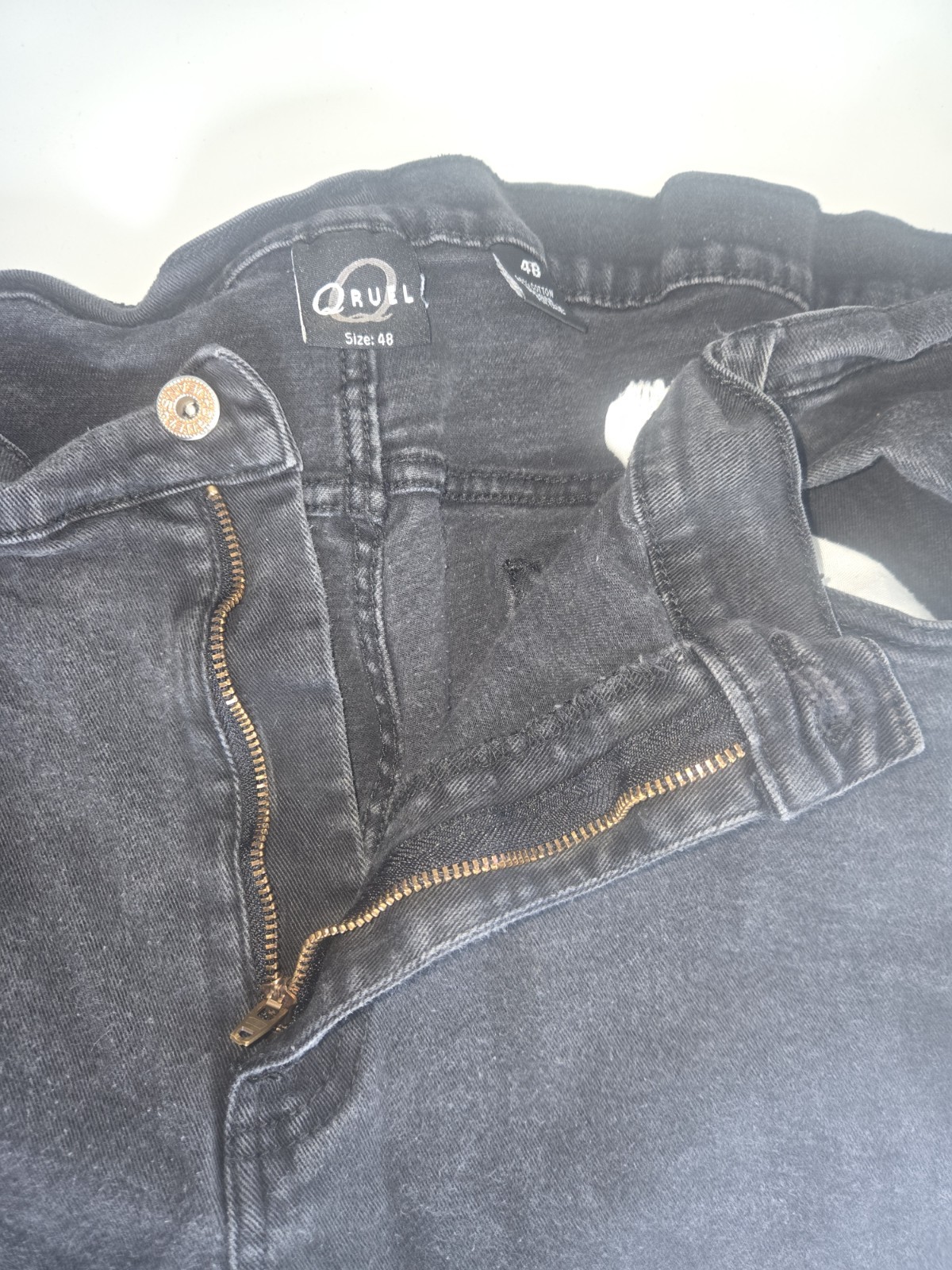 Mens size 48 faded black denim jeans.