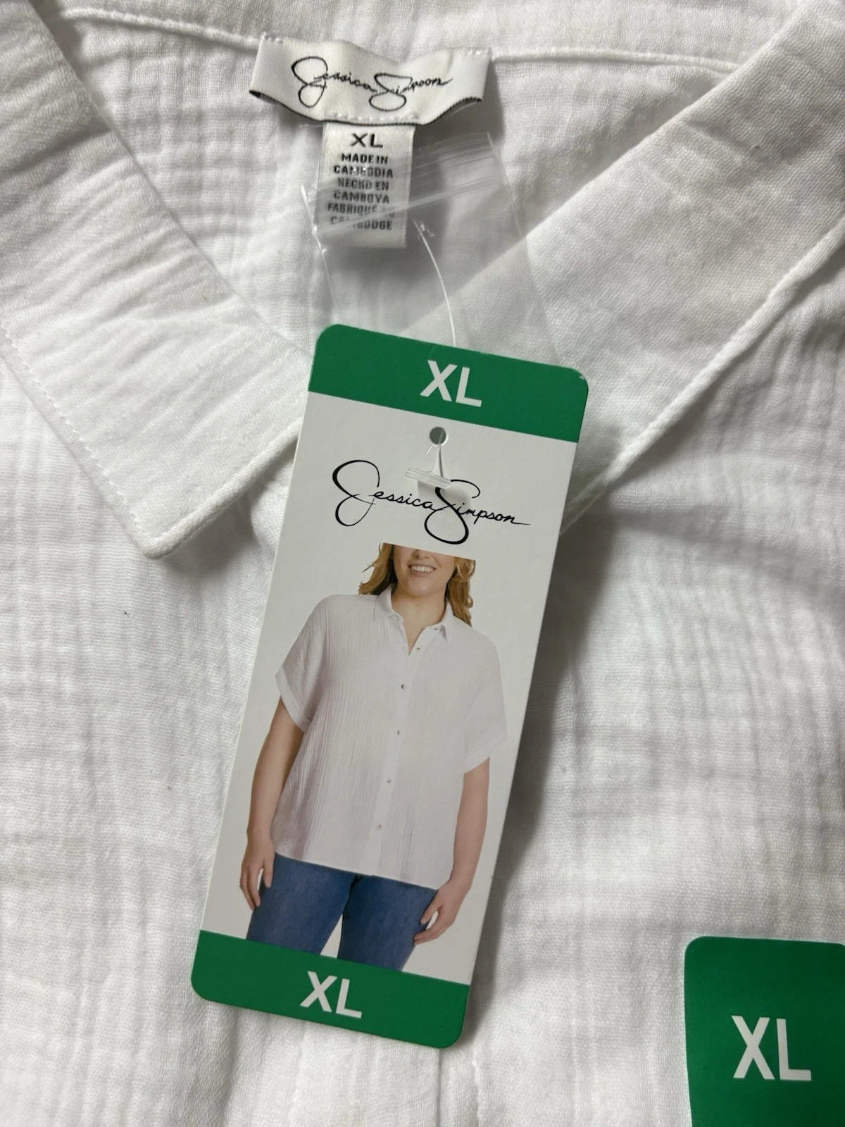 Jessica Simpson Women’s Short Cap Sleeve Gauze Top(1859442)