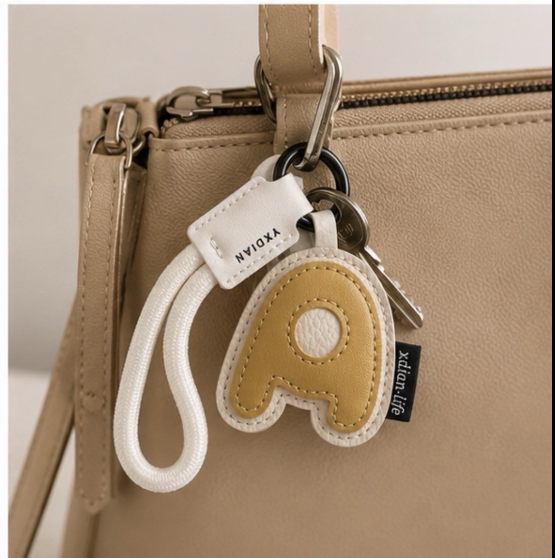 XXDIAN Among Us Video Game Key Chain Beige/White Faux Leather Metal Logo