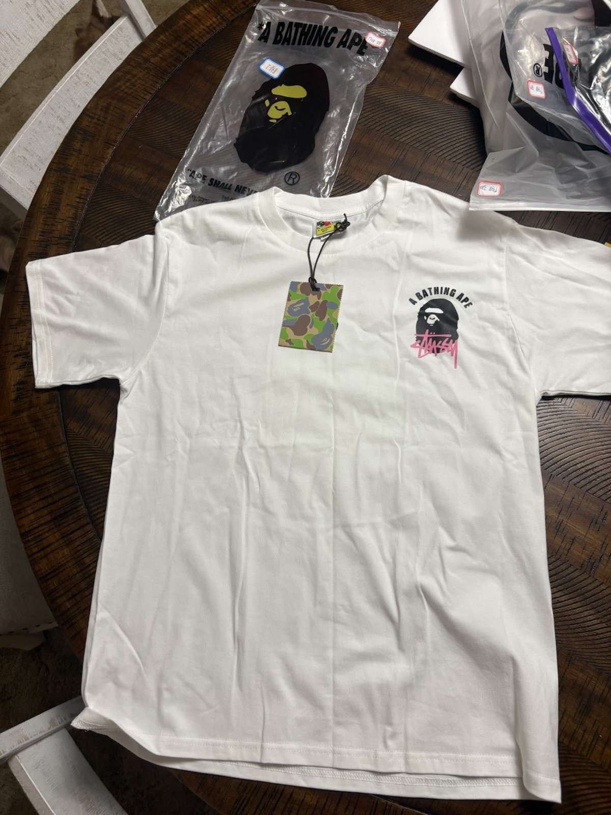 A Bathing Ape (BAPE) x Stussy Men’s L White Ape Head Graphic Tee Crew