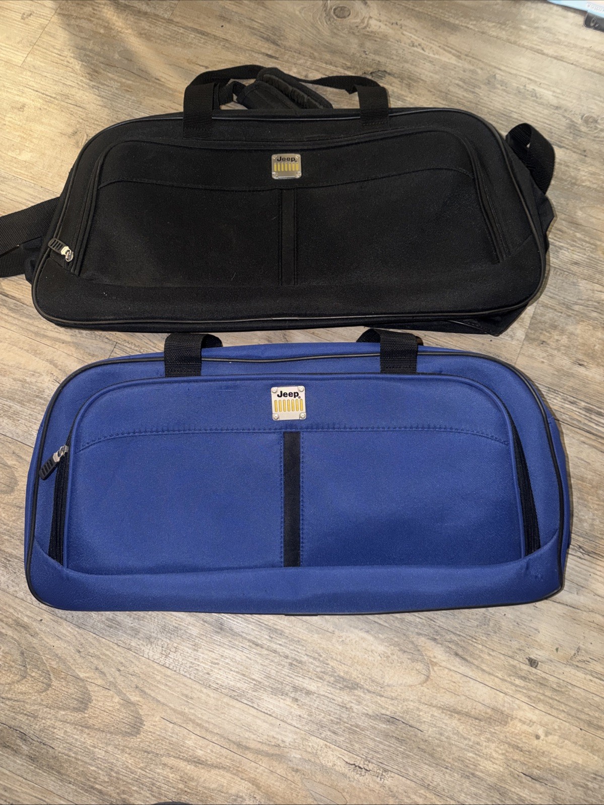 Vintage Black And Blue Jeep Duffle Bags Used + draw string bag. See description