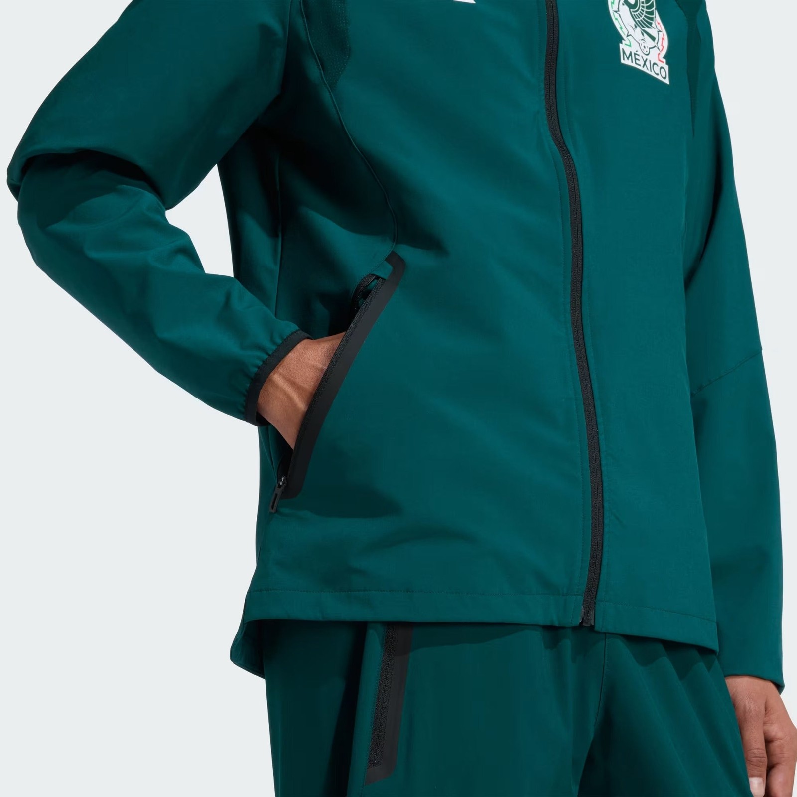 [JZ6486] MENS ADIDAS FMF MEXICO TIRO TRAVEL FULL ZIP WINDBREAKER – AURORA IVY