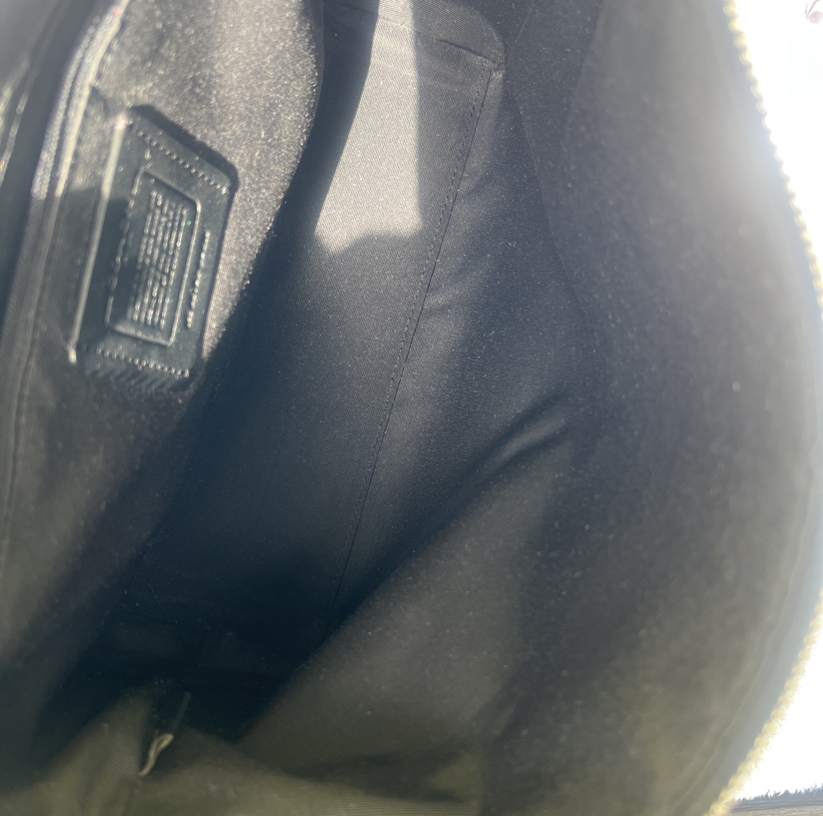 Coach Crossbody Bag Black Pebble Leather black Interior with silver hardware.