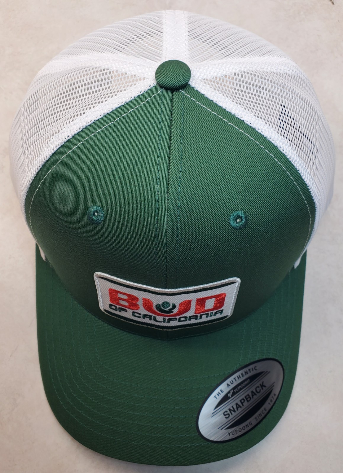 Bud of Calif Patch on Yupoong 6606 Classics Trucker Hat Snapback Evergreen/White