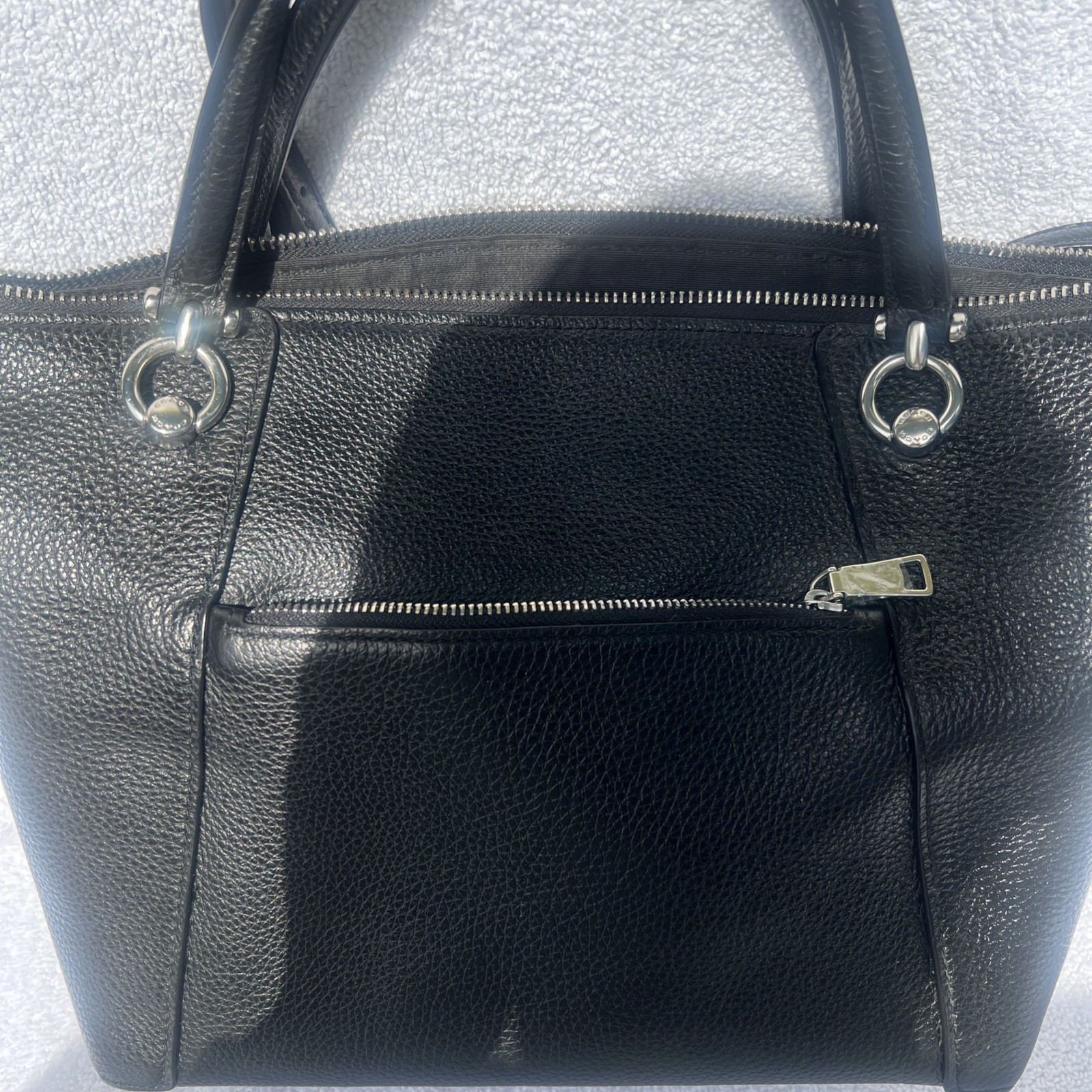 Coach Crossbody Bag Black Pebble Leather black Interior with silver hardware.
