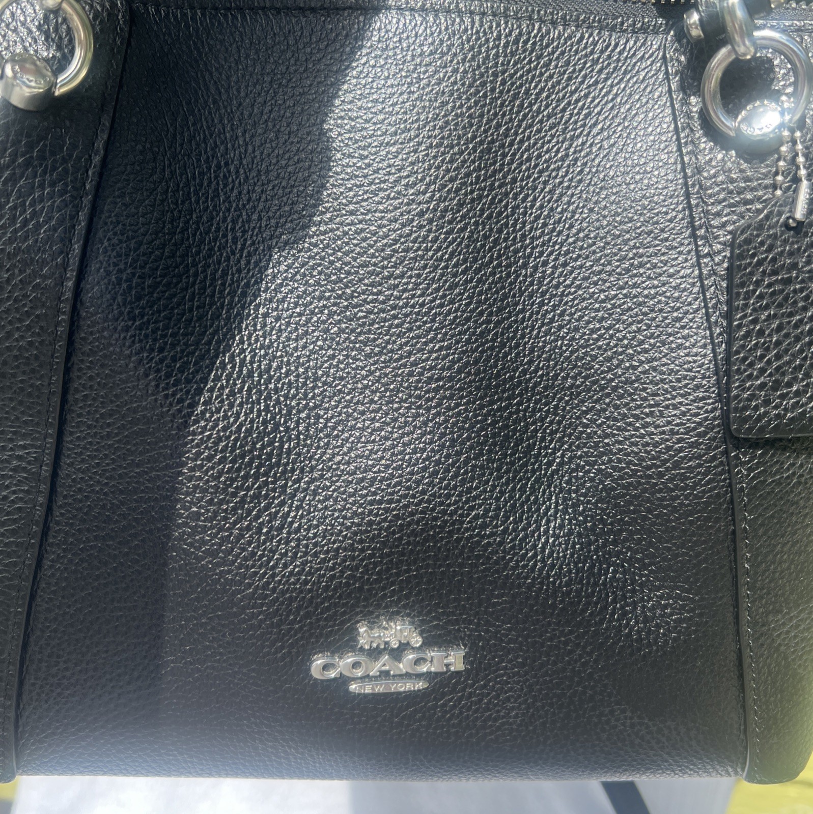 Coach Crossbody Bag Black Pebble Leather black Interior with silver hardware.