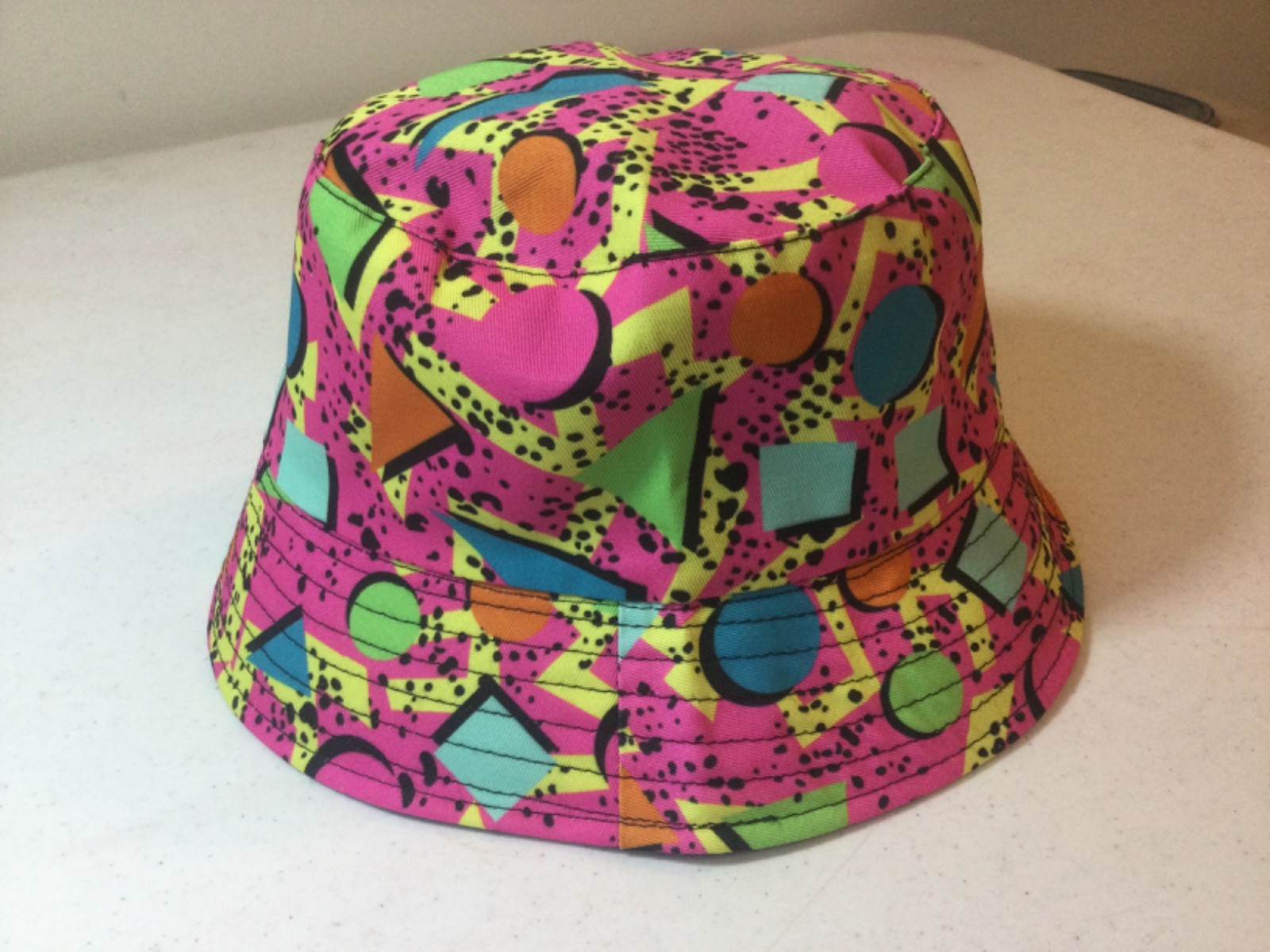 Pink/ multicolor 1980’s style one size fits all Bucket hat