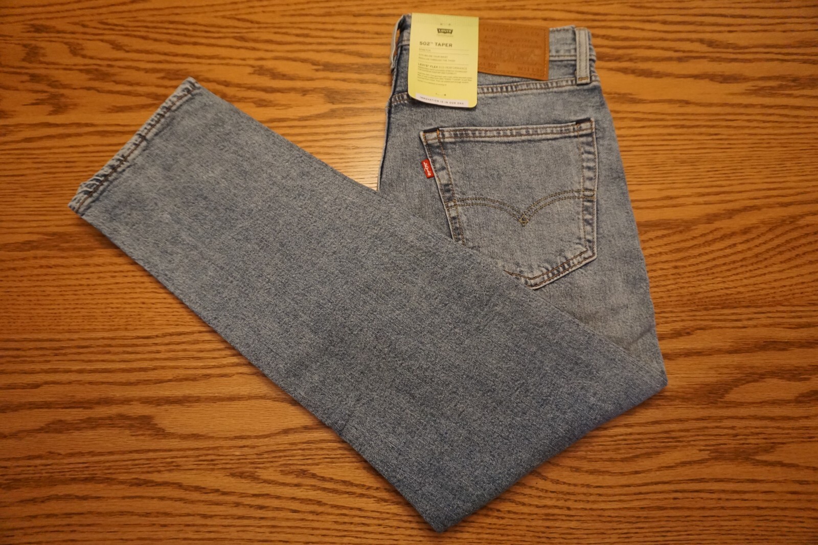 NWT MEN’S LEVI JEANS 502 Multiple Sizes Taper Flex Eco Performance Premium $98