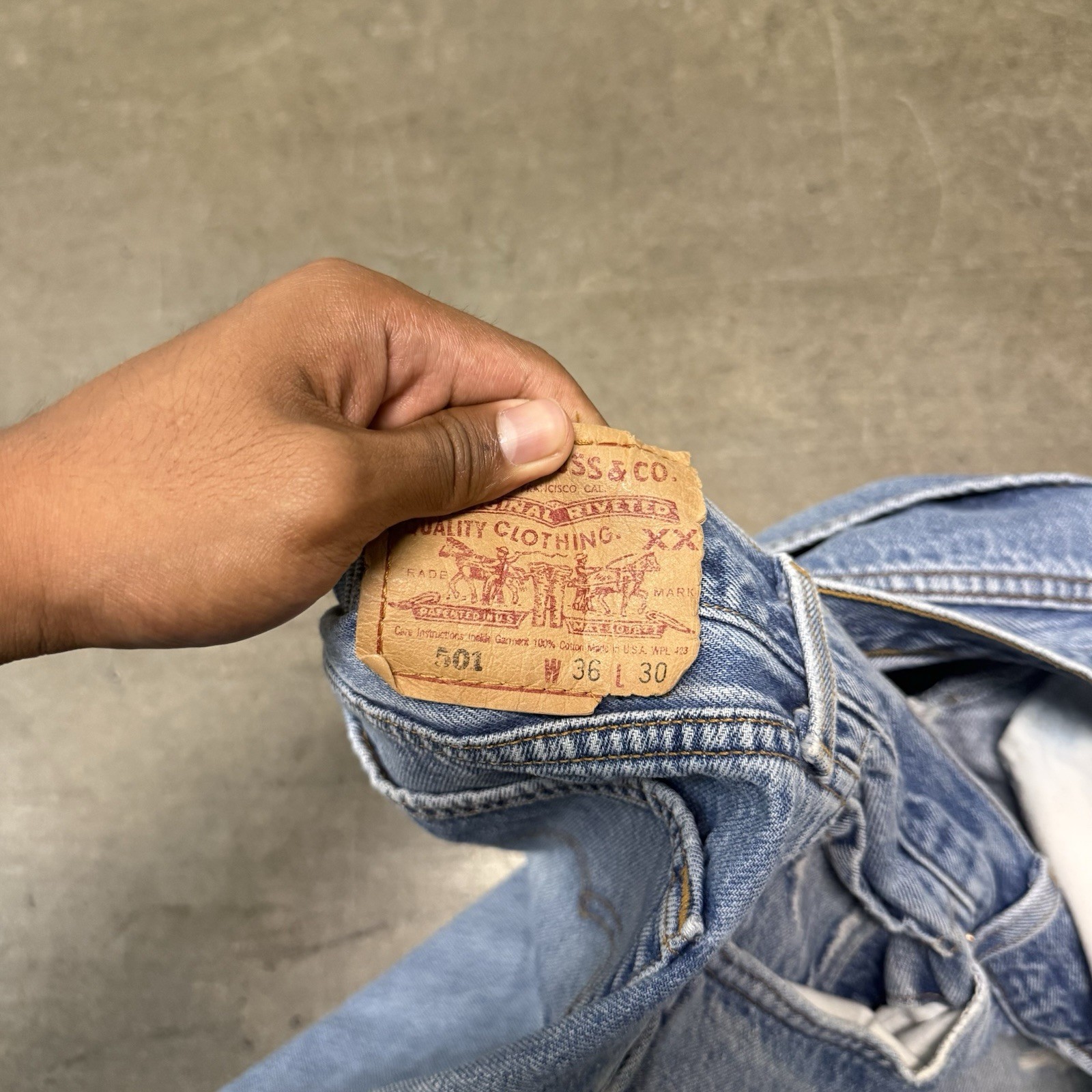 VINTAGE 90s Levi’s 501 Series button fly light wash straight jeans distressed