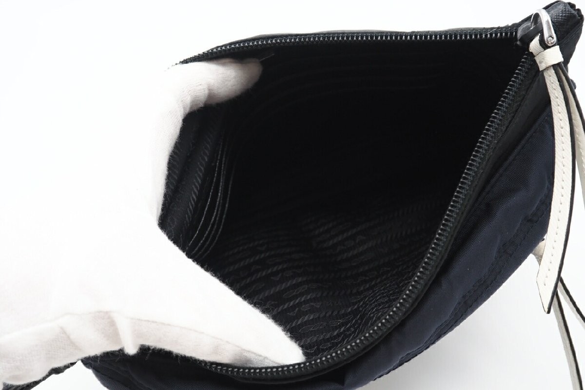 Returns accepted within 3 days PRADA Tesuto Saffiano City Camouflage Clutch Pouc