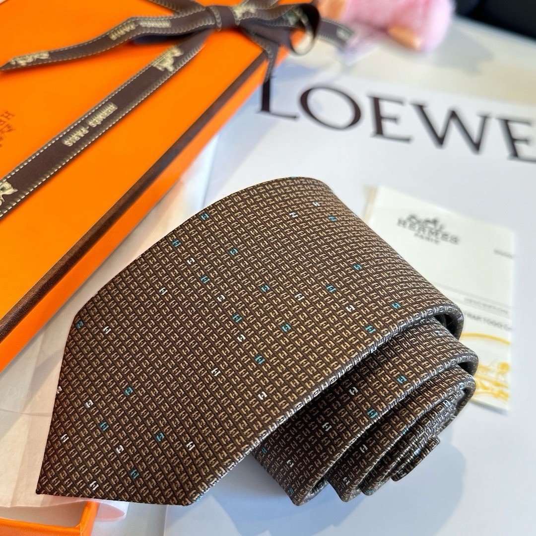 Hermès Men’s Brown Silk Tie Geometric Logo Pattern Designer One Size