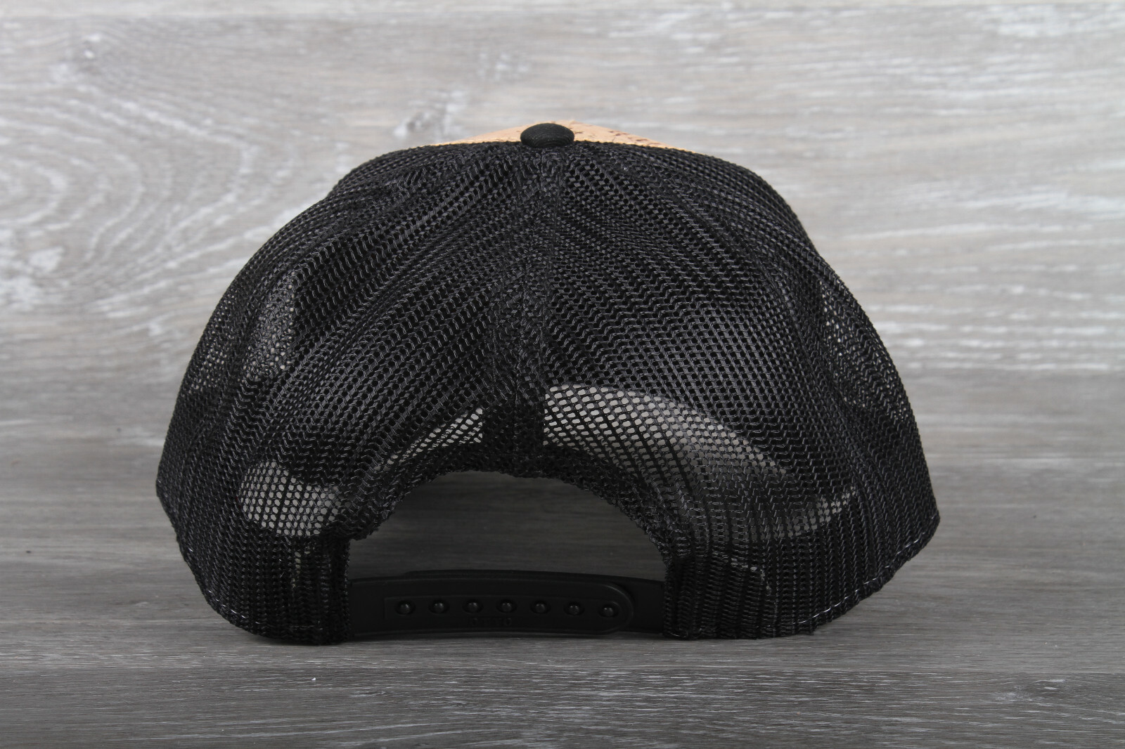 Rainbow trout leather patch on an Otto 6 Panel Cork Mesh Back Hat