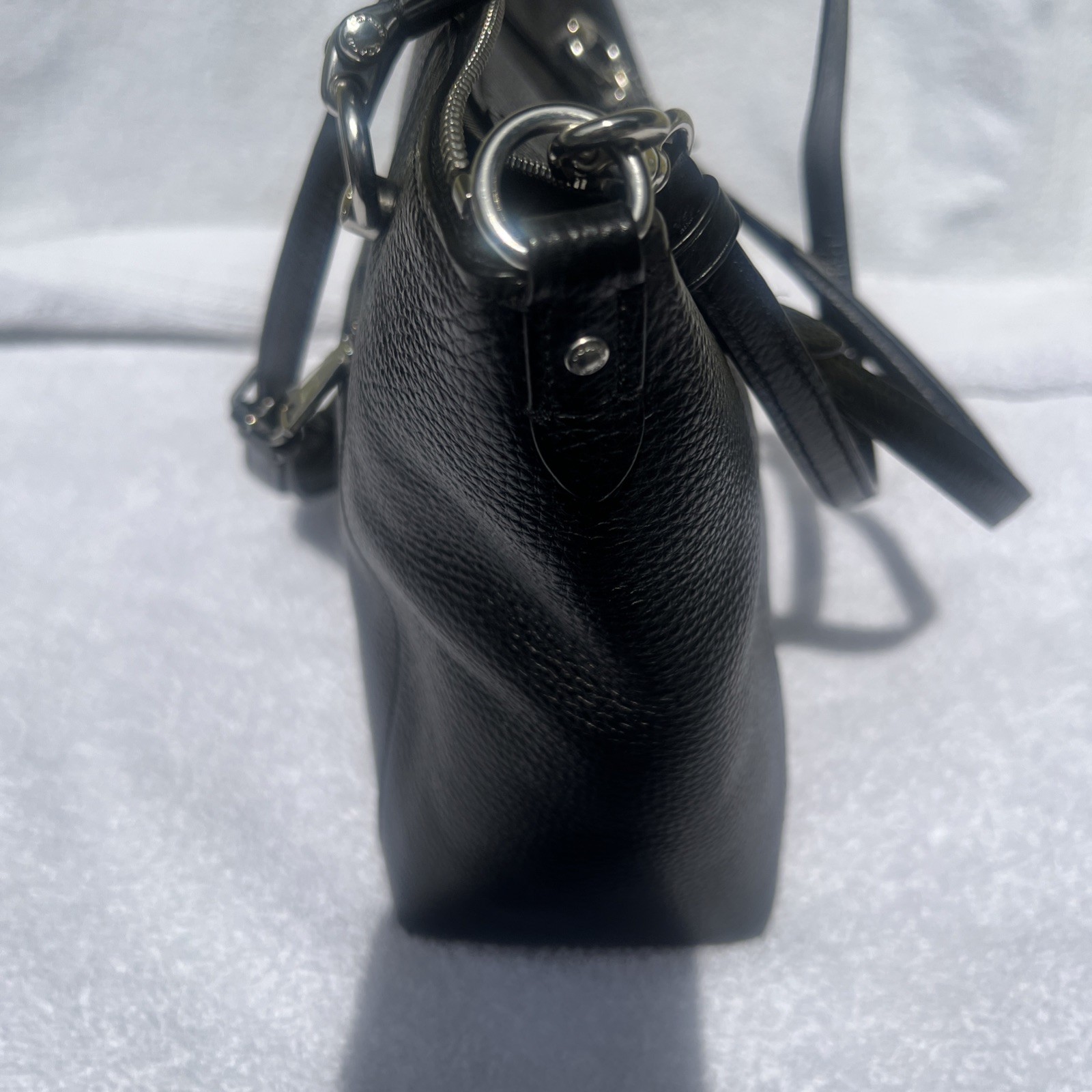 Coach Crossbody Bag Black Pebble Leather black Interior with silver hardware.