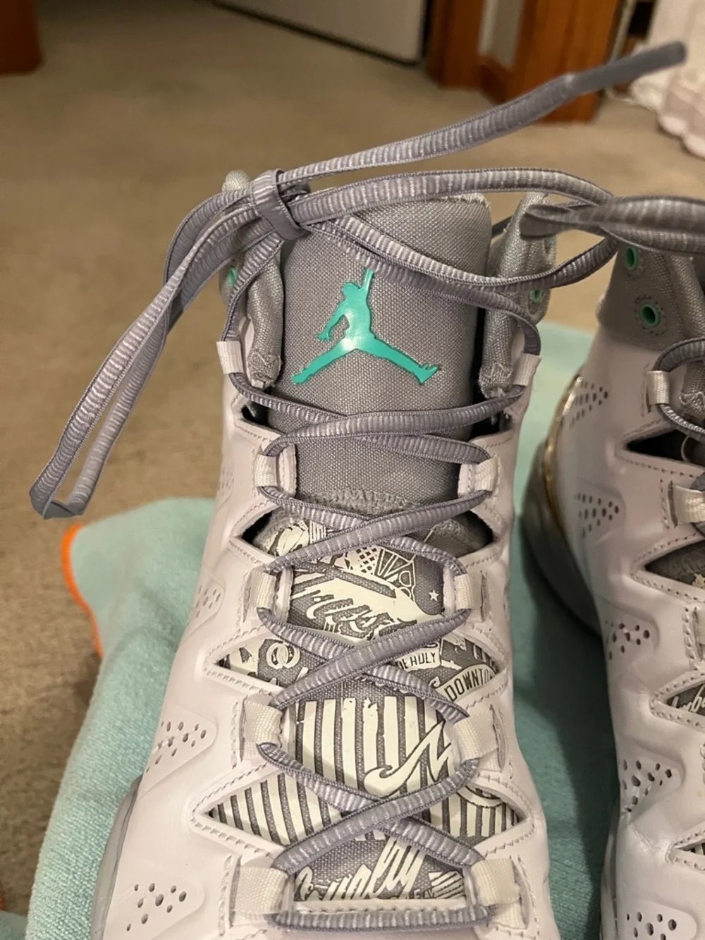 Air Jordan Melo M10 in the Green Glow color way
