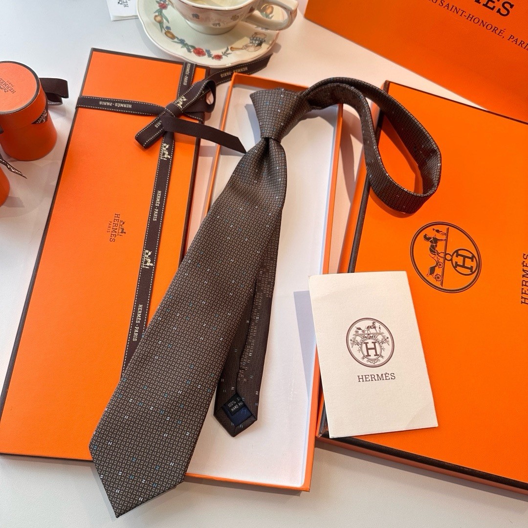 Hermès Men’s Brown Silk Tie Geometric Logo Pattern Designer One Size