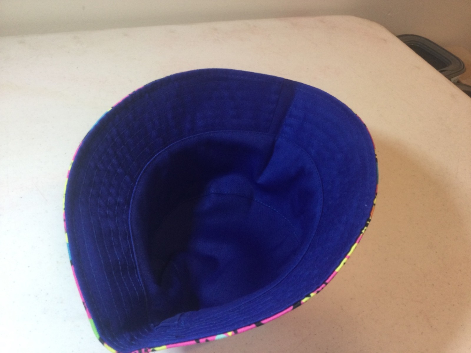 Pink/ multicolor 1980’s style one size fits all Bucket hat