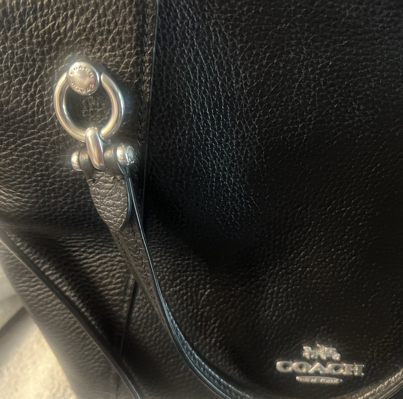 Coach Crossbody Bag Black Pebble Leather black Interior with silver hardware.