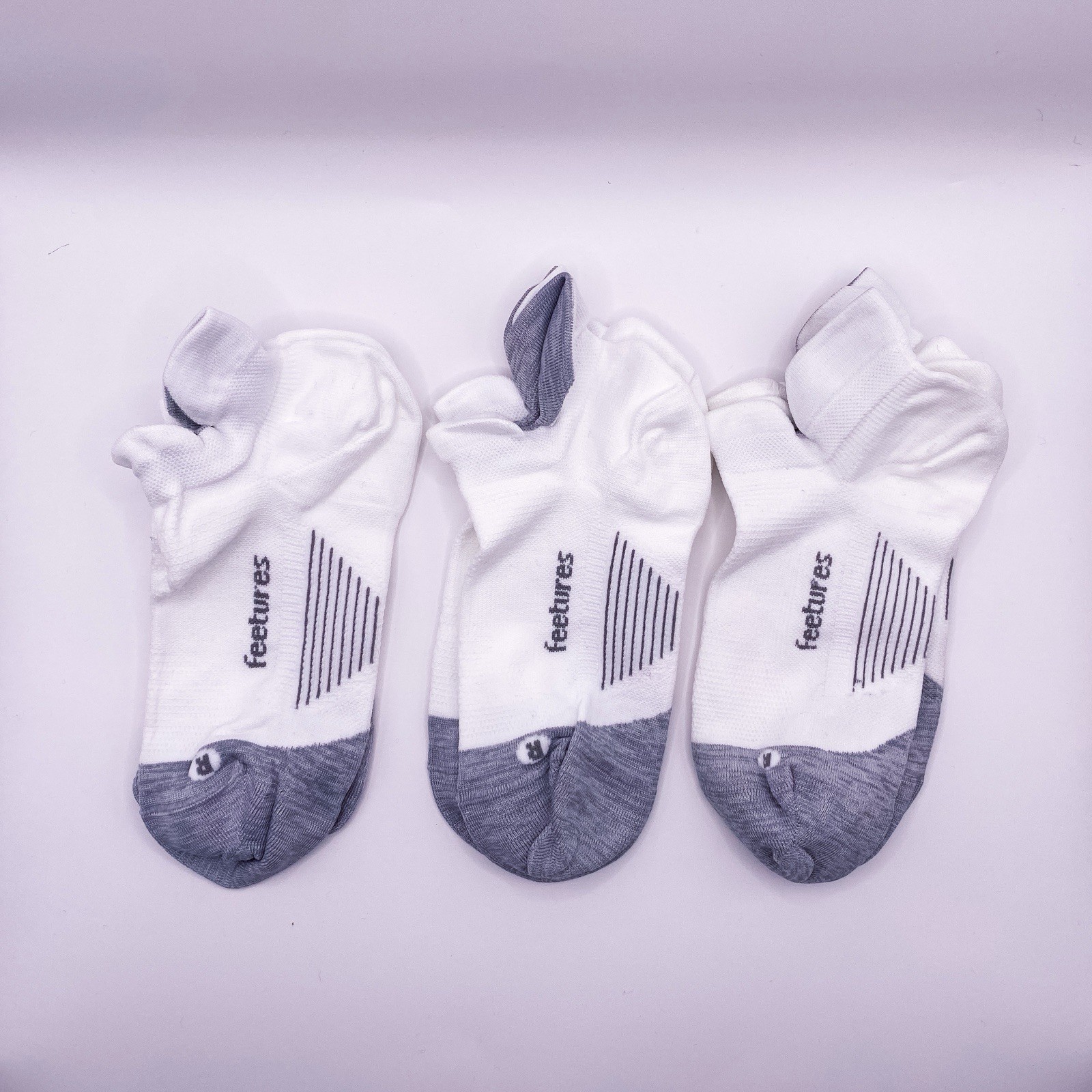 3 Pairs Feetures Elite Light Cushion No Show Tab Socks Medium – Unisex