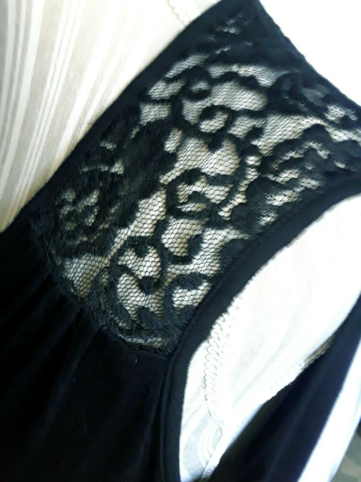 TA1-18 Free Kisses woman’s black sleeveless top size XL, new with tags soft lace