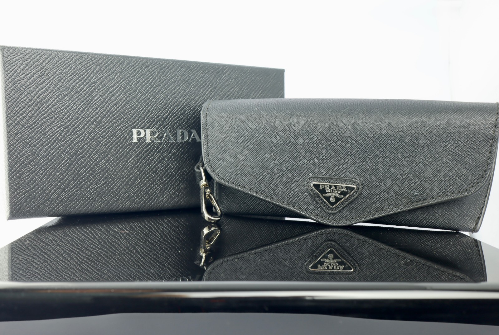 Prada PR26ZS Black / Gray Lens Oval Sunglasses 100% UV