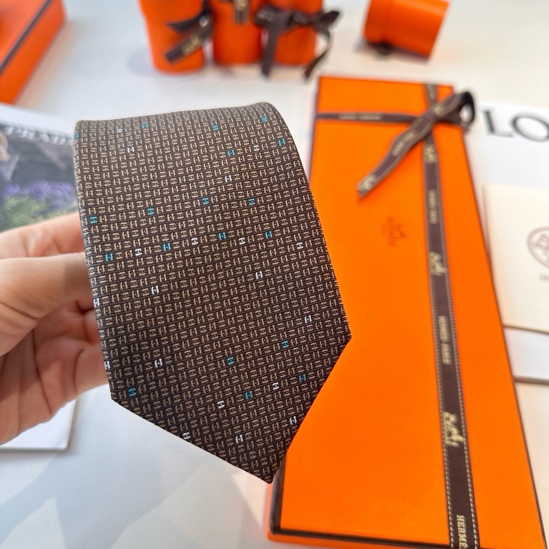 Hermès Men’s Brown Silk Tie Geometric Logo Pattern Designer One Size