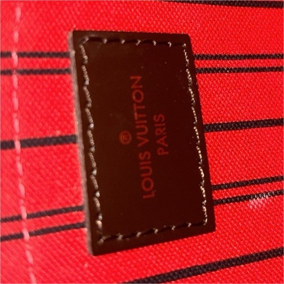 Louis Vuitton Damier Ebene Brown Checkered Wristlet Bag