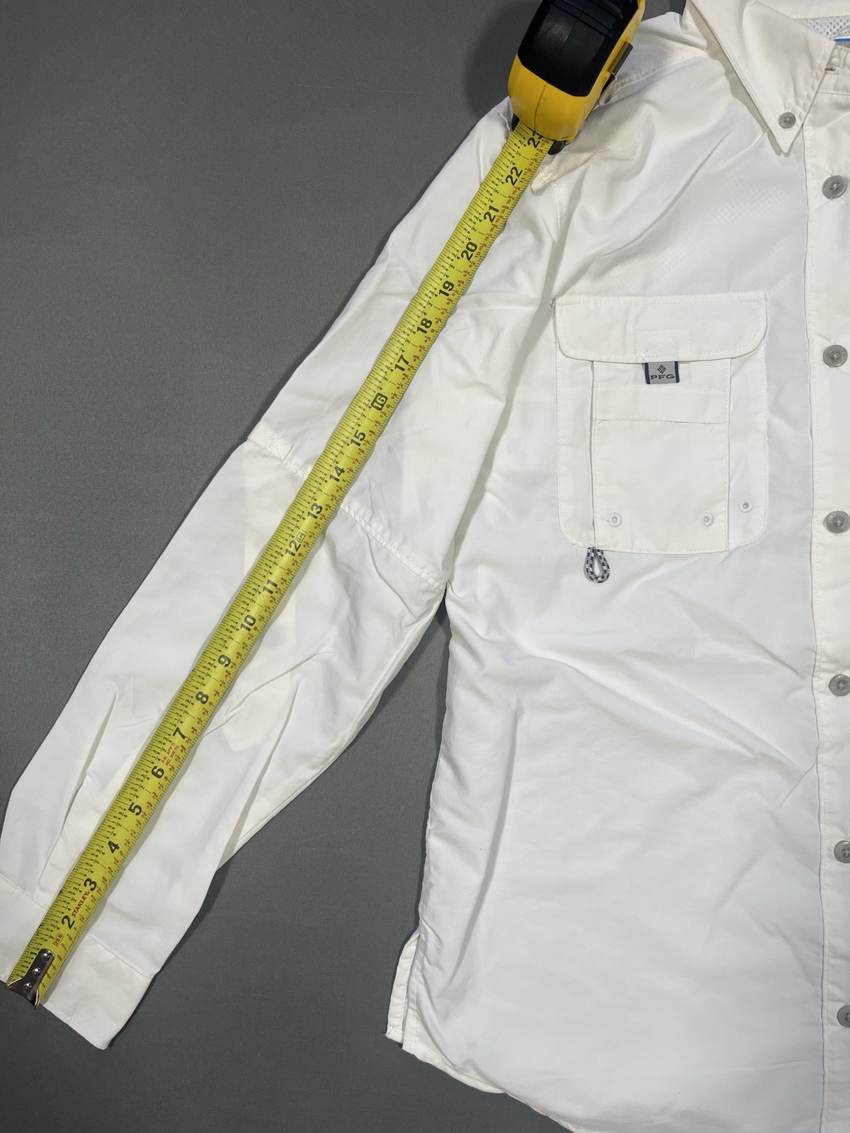 White Columbia PFG Bahama II and features two chest pockets with Utility Loops