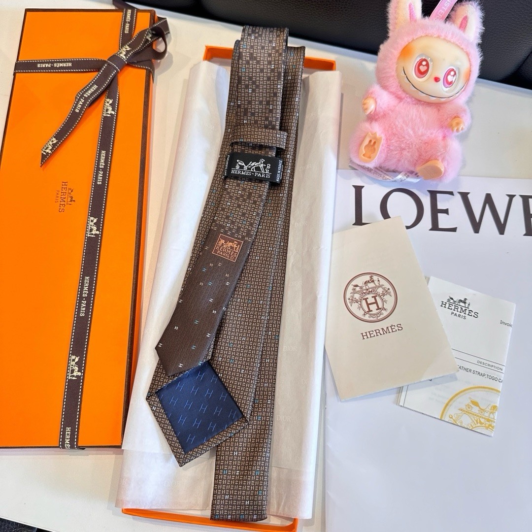 Hermès Men’s Brown Silk Tie Geometric Logo Pattern Designer One Size