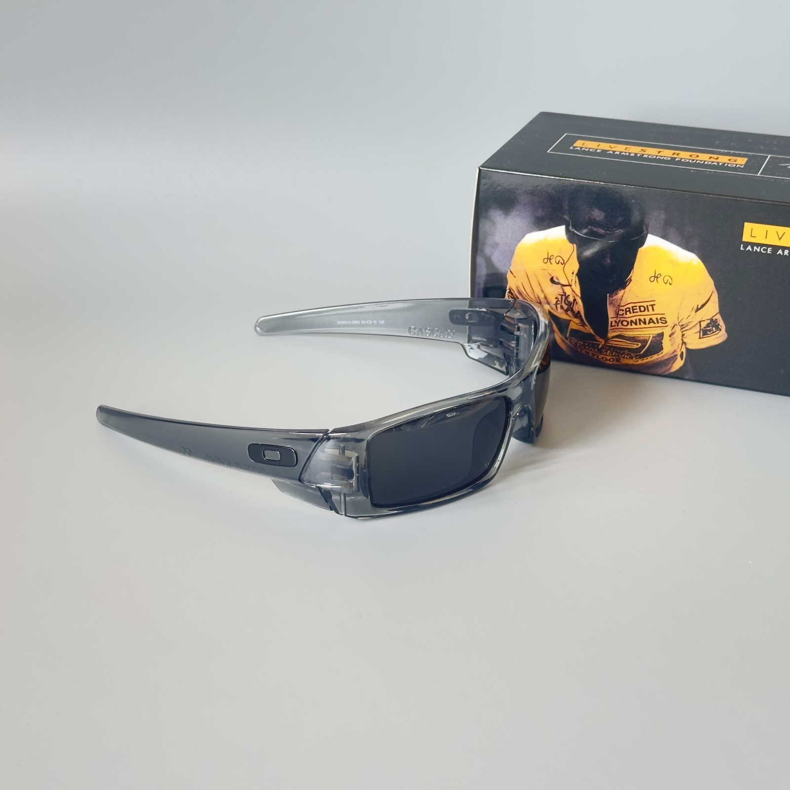 Oakley Gascan OO9014 Polarized Sunglasses Gray transparent Frame Black Lens